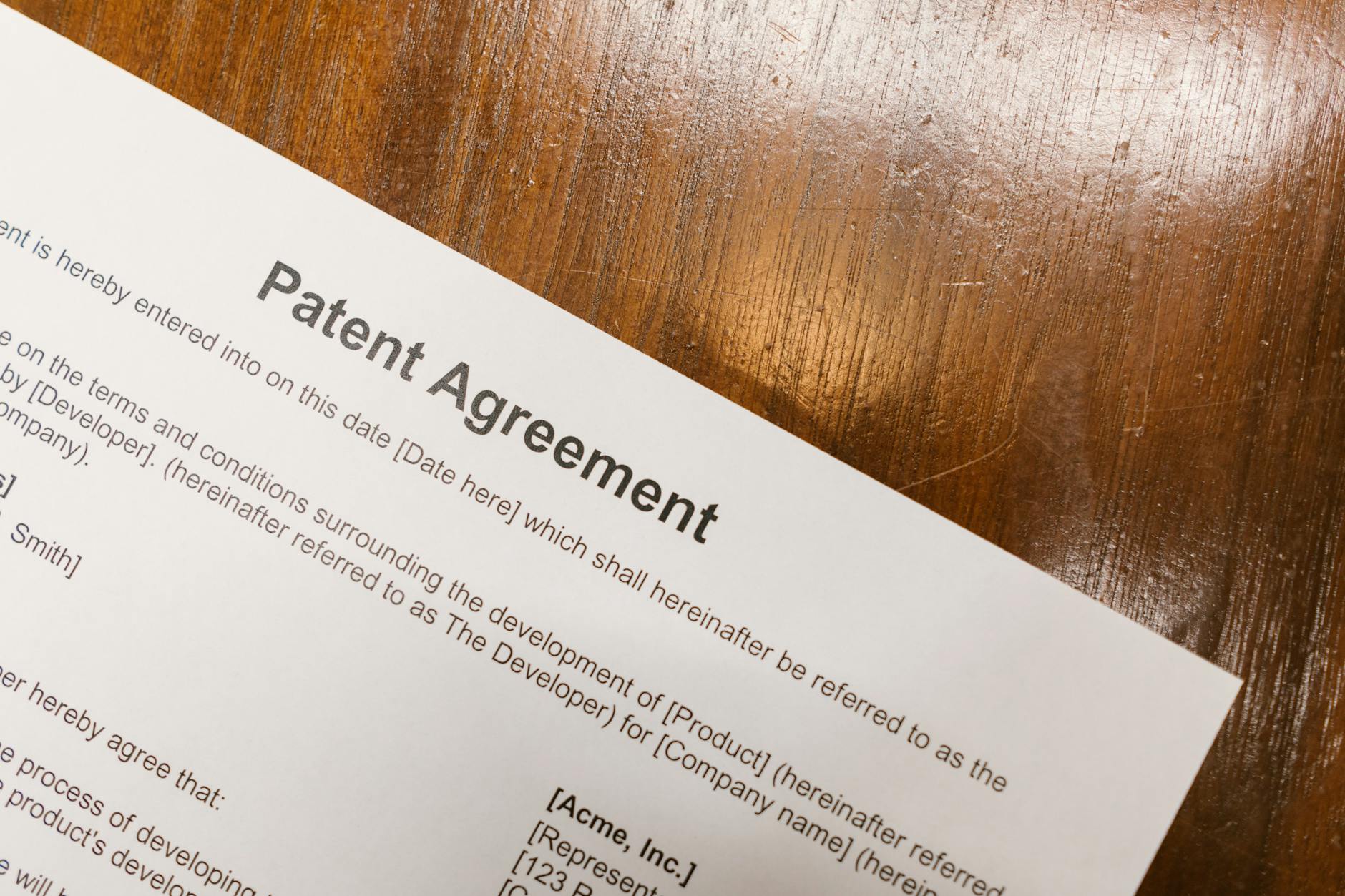 close up shot of a document on a wooden table